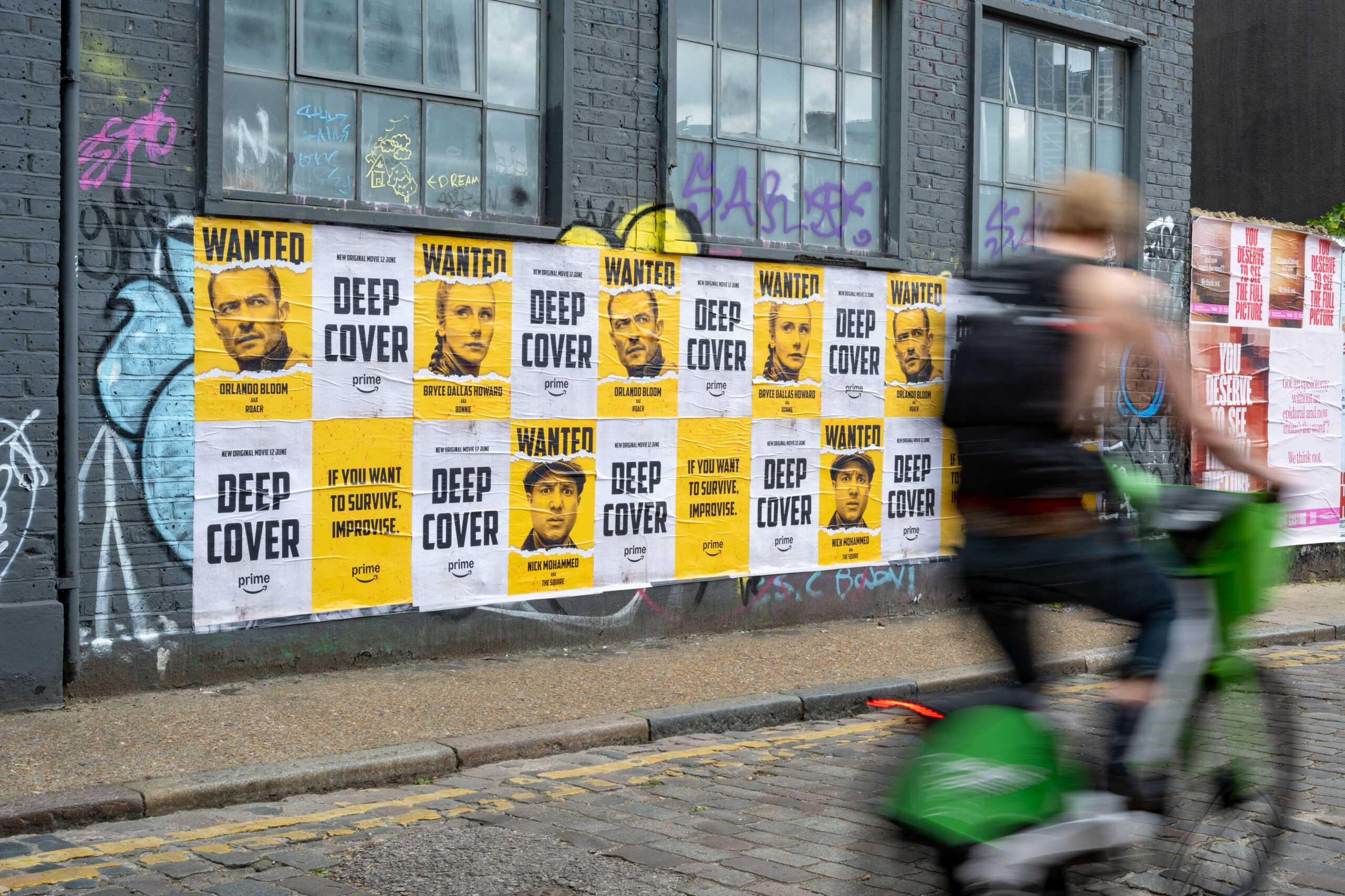 An example of a flyposting ad campaign in Shoreditch, London for Prime Video.