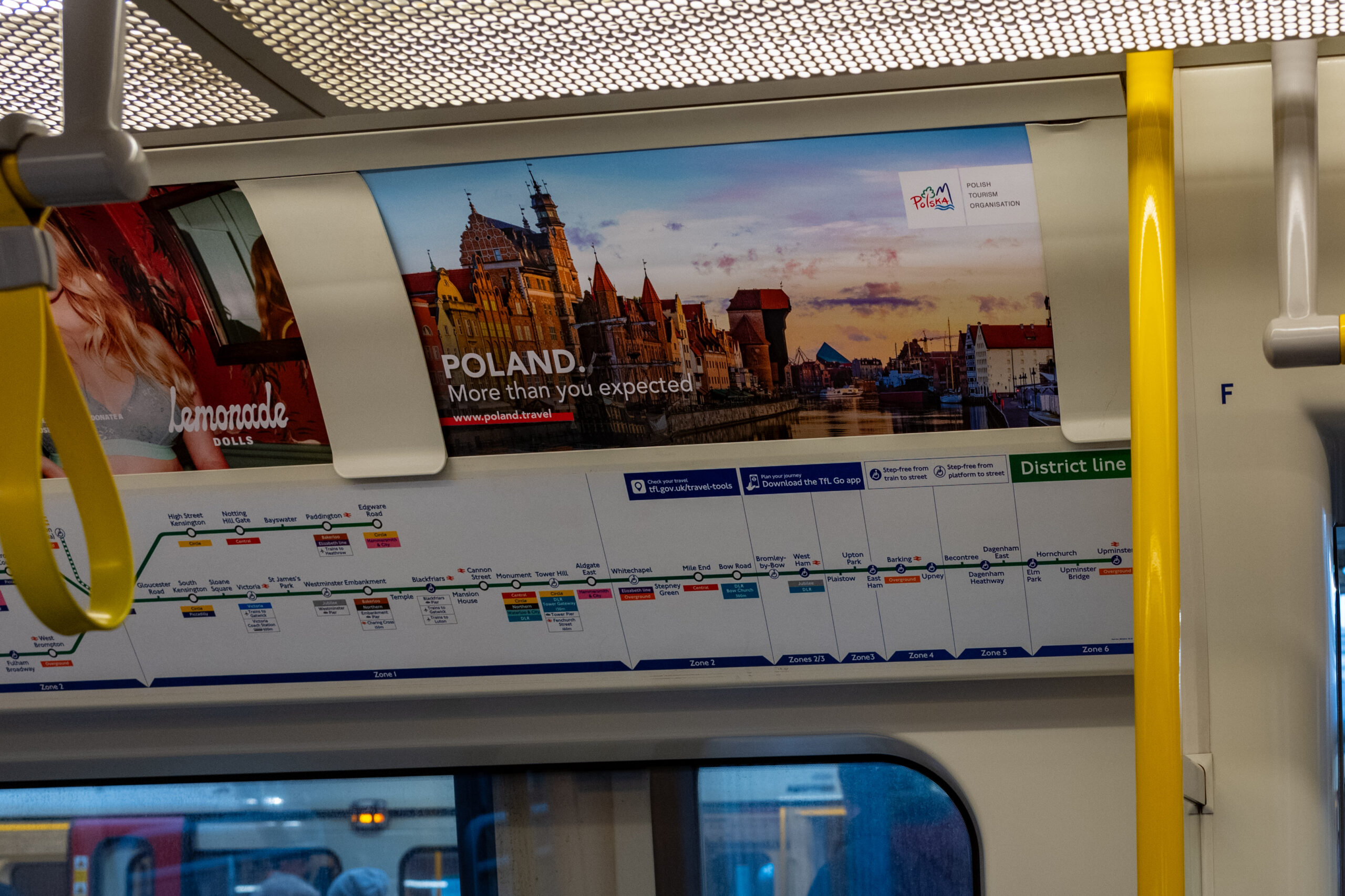 Out of home advertising campaign promoting a travel destination in a transport hub