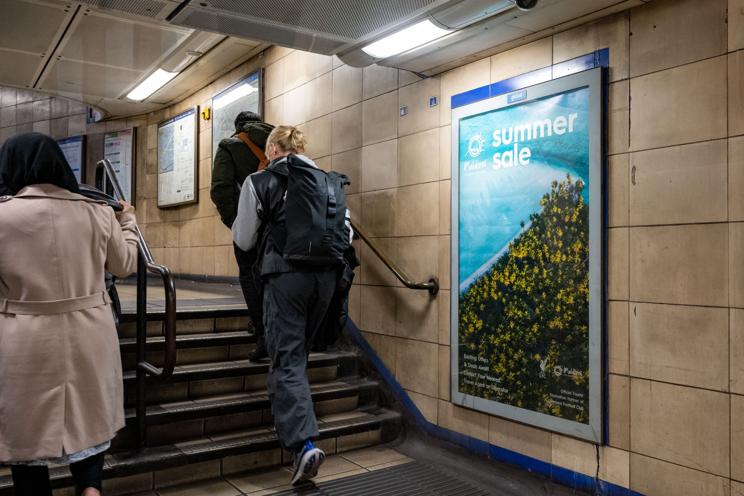 Visit Maldives - Excite Out Of Home Travel and tourism advertising displayed in a busy underground station