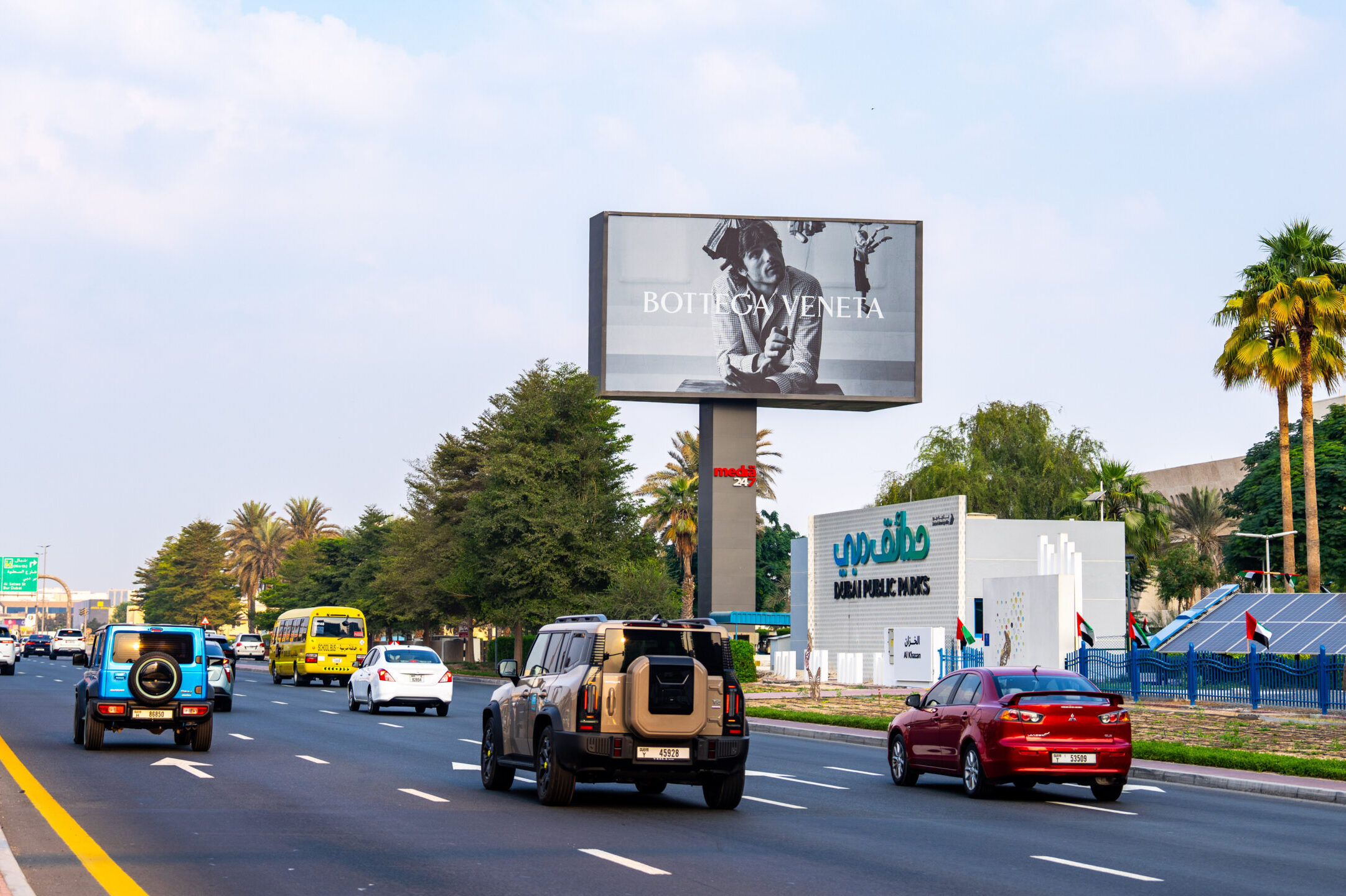 Outdoor advertising campaign on a Dubai roadside billboard