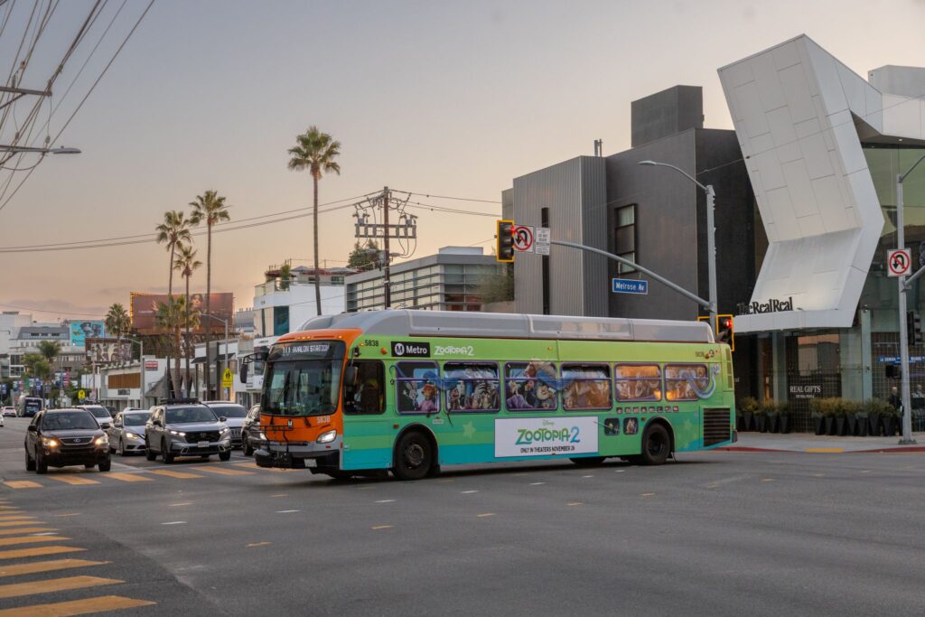 Bus advertising on a busy street in Los Angeles