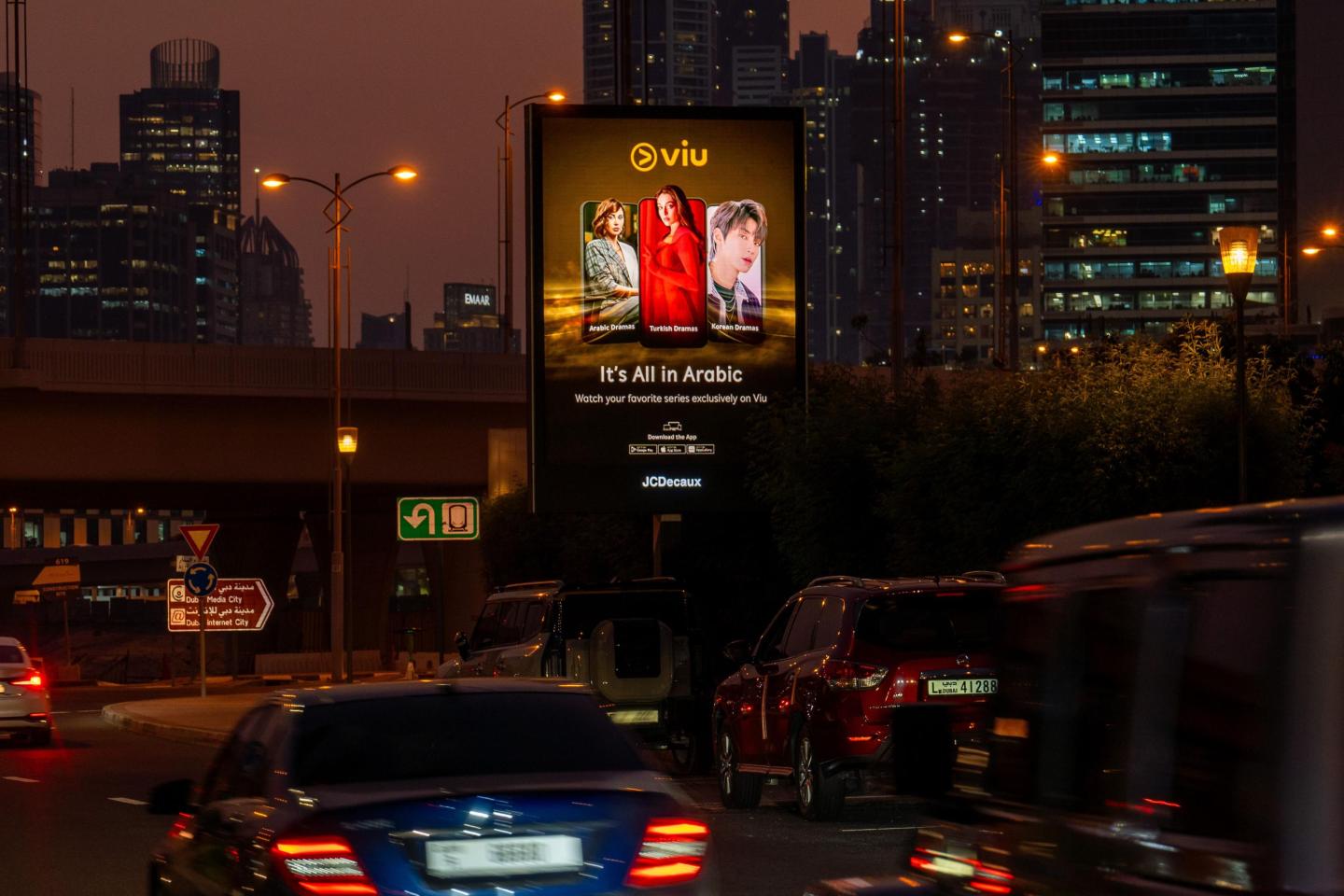 Digital out of home advertising screens in Dubai at night