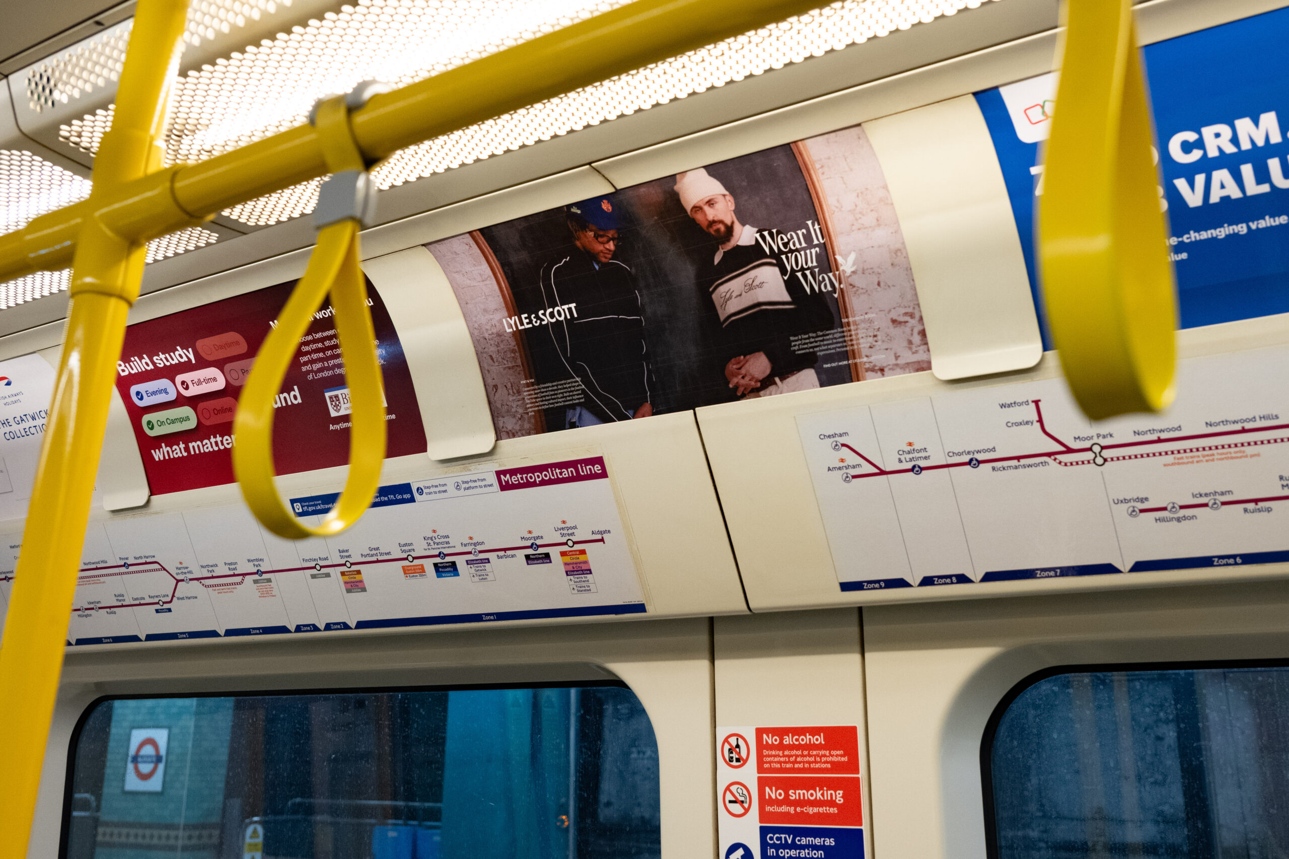Interior advertising panels inside a London Underground train